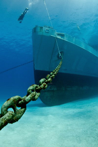 Bow and anchor chain of the USS Kittiwake; a natural ligh... by Paul Colley 